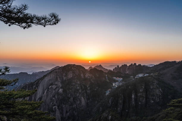 istock Sunrise in Huangshan mountains 968726238