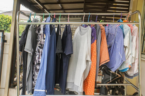 istock selective focus wet people cloth dry on the stainless hanger 968728576