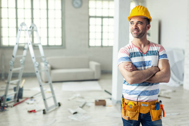 istock Manual worker standing arms crossed in new apartment 968752520