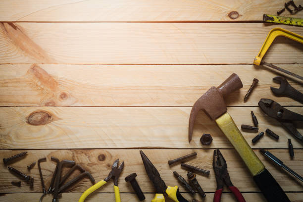 istock Top view of variety rusty handy tools on wooden background with copy space 968782630