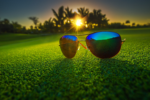 Beautiful glasses on golf course.