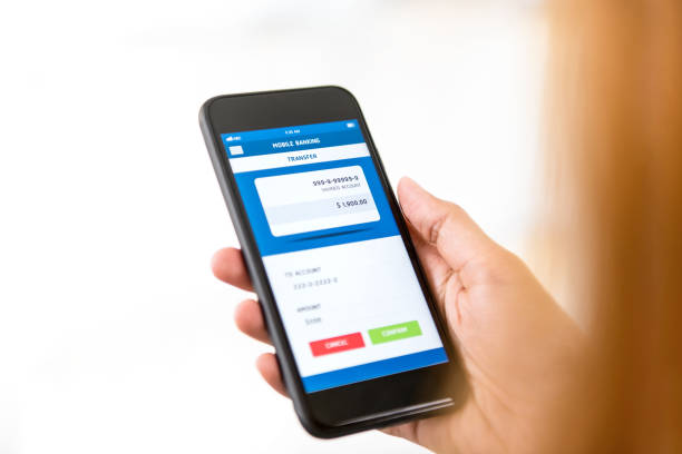 istock Woman hand using smartphone transferring money online 968788900