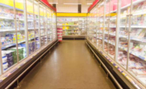 istock blurred image of  supermarket aisle with shelves 968799154