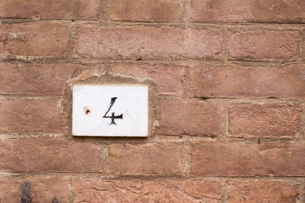 istock Old house sign with the number four 968802340
