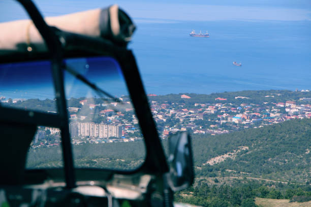 istock View from a mountain to small town near sea 968803138