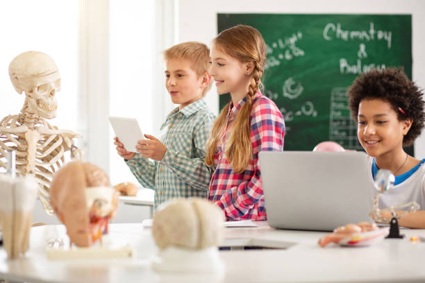 istock Happy delighted children enjoying their class 968809762