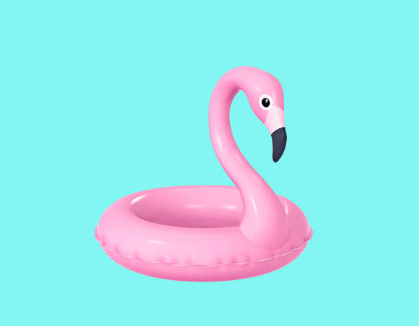 inflatable flamingo isolated on turquoise background - swim ring imagens e fotografias de stock