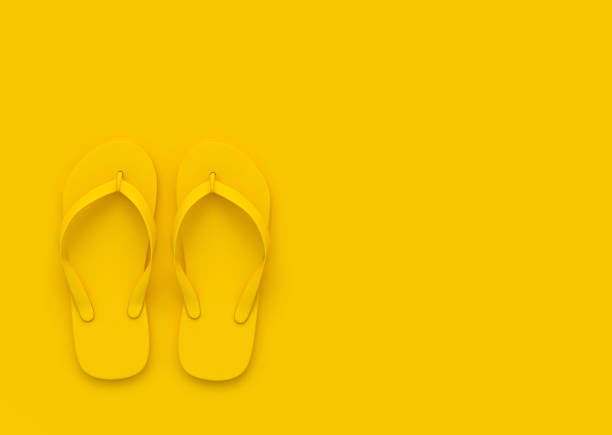 Flip flops on orange background with copy space, summer concept. 3D rendering