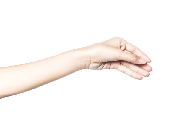 istock hand holding something like a bottle or can 968816512