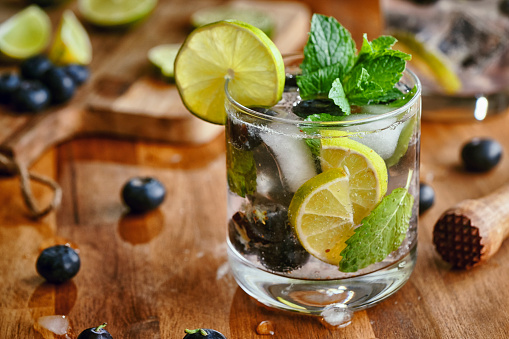 Blueberry Mojito with white rum, lime, mint and crushed ice