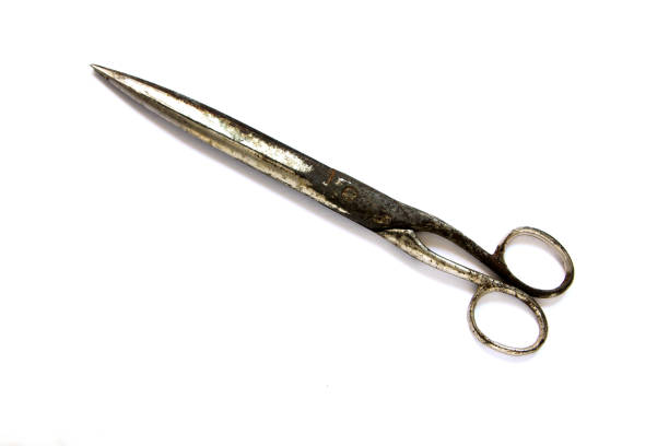 istock Old scissors isolated on white background. Vintage rusty scissors isolated on white background. 968819328