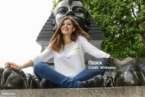 Smiling In The Arms Of The Sphinx Bulgarian Outdoor Girl Stock Photo - Download Image Now