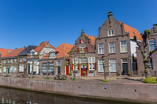 Historic houses at a canal in Hasselt, Netherlands