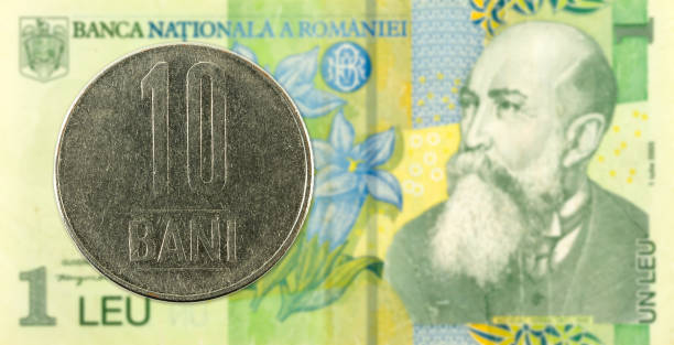 istock 10 romanian bani coin against 1 romanian leu bank note 968822924
