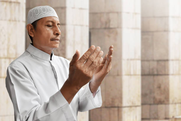 istock Old muslim man praying in mosque 968826838