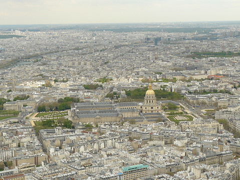 View of Paris from the Eiffel Tower with the hospital of the invalids in the foreground.