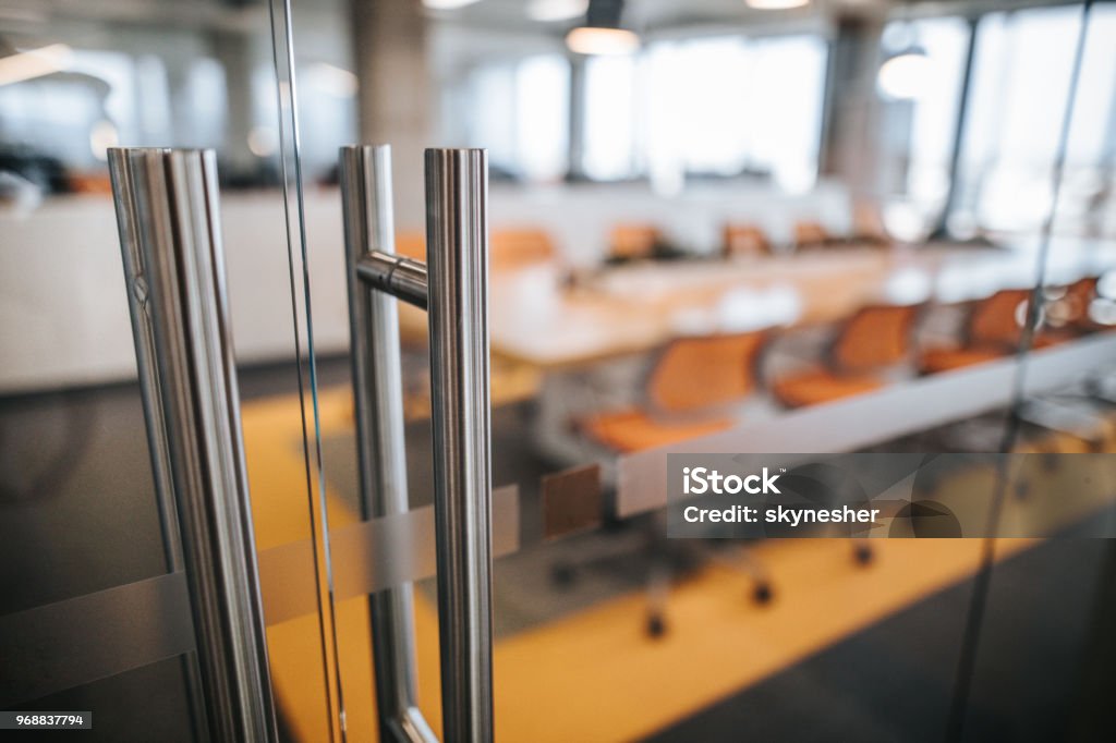 Close up of glass door of a board room. Close up of an entrance door of a board room. Office Stock Photo
