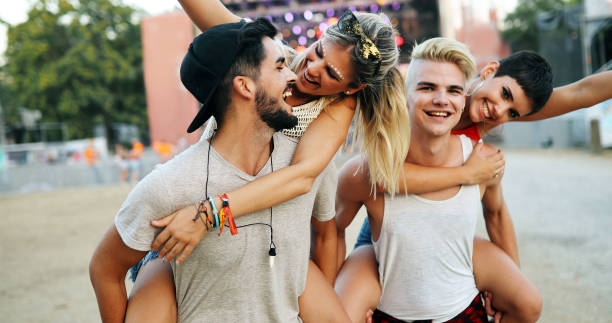 istock Group of young happy friends having fun time 968838342