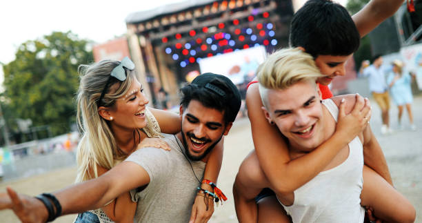 istock Group of young happy friends having fun time 968838412