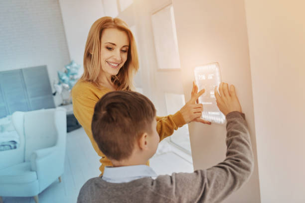 istock Young mother looking at her clever son and smiling 968842238