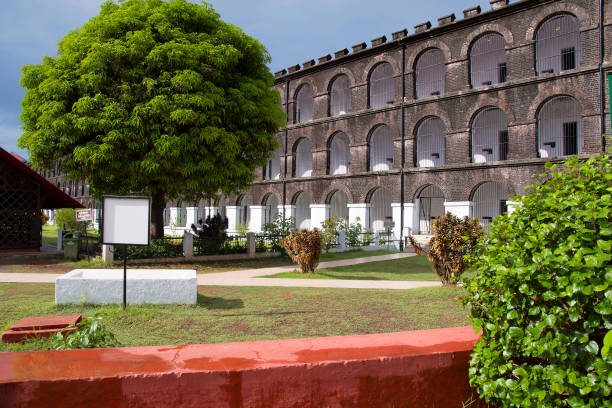Cellular Jail, Port Blair, Andaman islands Entrance courtyard with administrative building at back, the image shows three storied wing of Jail with arched corridors andaman sea photos stock pictures, royalty-free photos & images