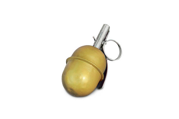 istock Dummy, plastic grenade, isolated on white. Hand grenade RGD-5 on asphalt. abandoned lost pomegranate green on the pavement. fragmentation grenade 968846574