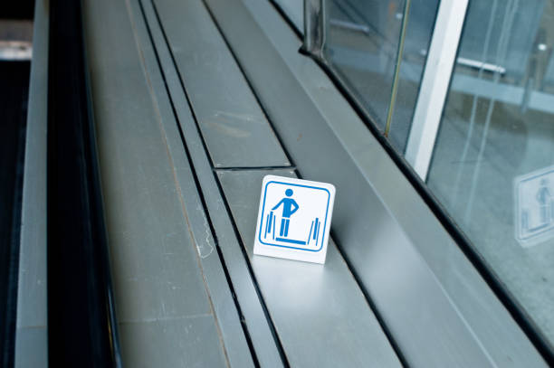 istock Information Sign For Escalator: Stand Right, Walk Left And Hold The Rail 968848790