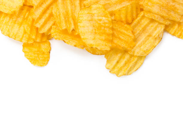 istock yellow potato chips isolated on white 968849668