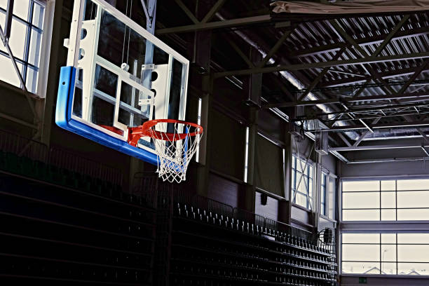 istock Basketball hoop in a game hall. 968849804