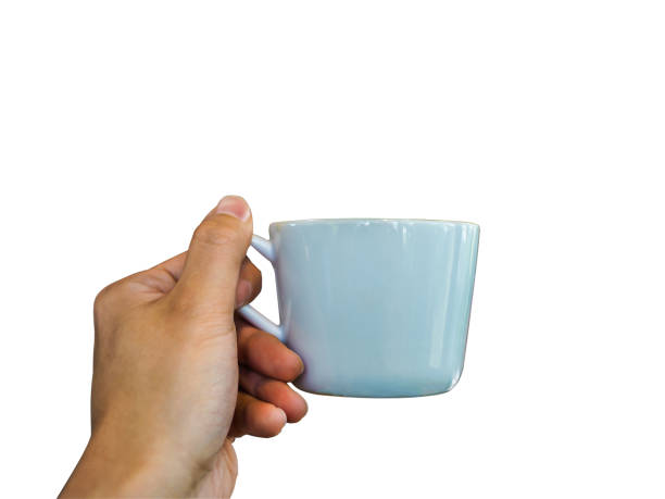 istock Coffee cup hand holding isolated on white background with clipping path 968855646