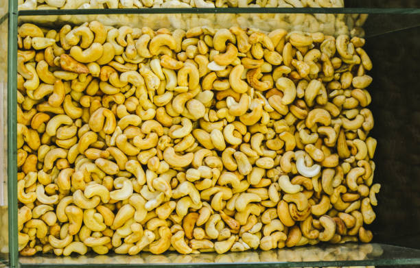 Nuts in the box. Non-packaged Nuts in the supermarket.