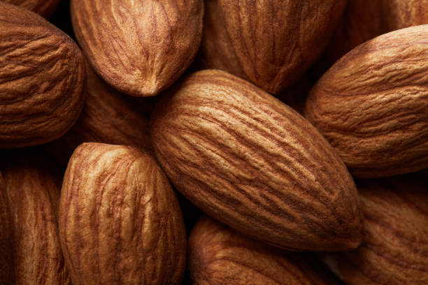 Organic texture of almonds. View from above stock photo