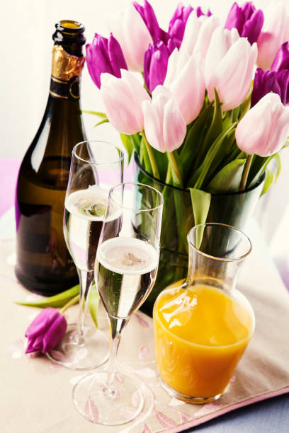 istock Two flute glasses filled with champagne 968860060