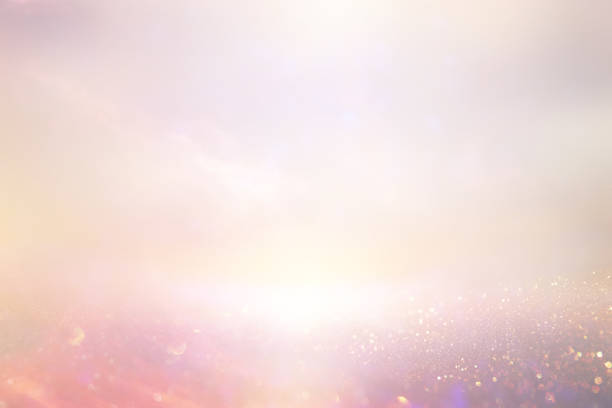 istock glitter vintage lights background. pink and silver. de-focused. 968863686