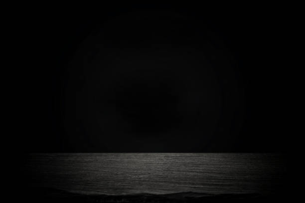 istock Spotlight concrete on slate board. dark black background. 968863690