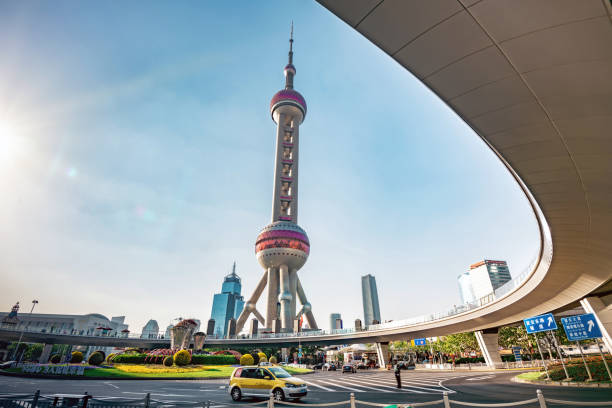 istock pedestrian bridge in front of Shanghai television tower 968864496