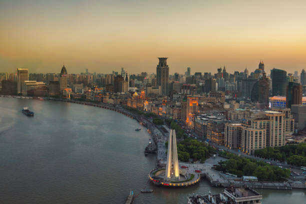 istock shanghai skyline with huangpu river at sunset hour 968867178