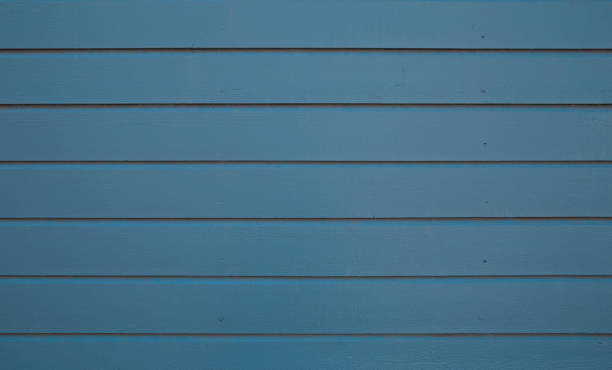 Slice the blue siding on old house