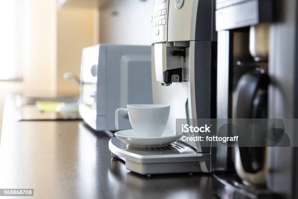 Mug Stands In A Coffee Machine Stock Photo - Download Image Now - Coffee Maker, Industry, Kitchen