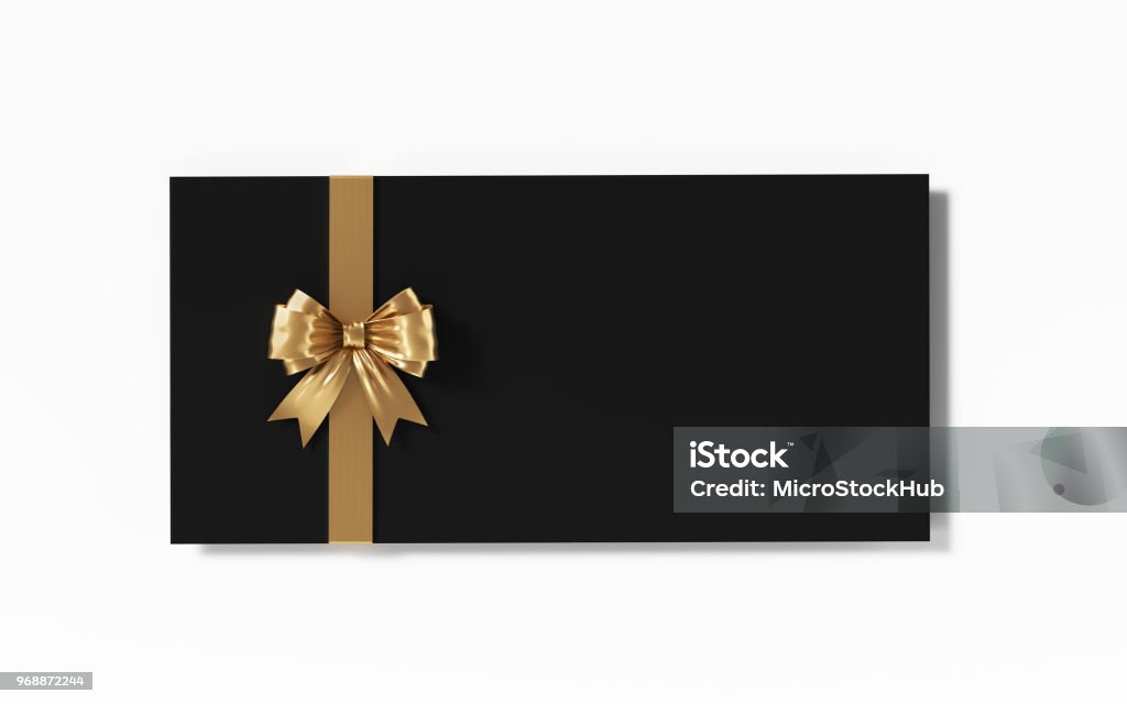 Black Gift Card With Gold Colored Bow Tie On White Background Black gift card with gold colored bow tie on white background. Horizontal composition with clipping path and copy space. Gift Certificate or Card Stock Photo