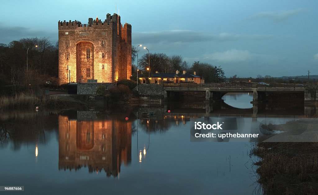 bunratty castle at night over looking a river  Castle Stock Photo