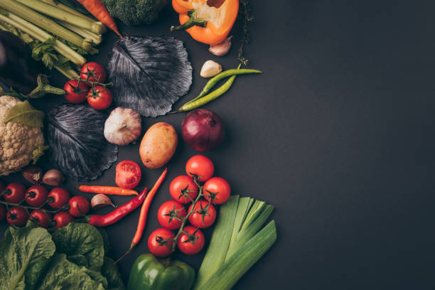 istock top view of colored vegetables on gray table 968879136