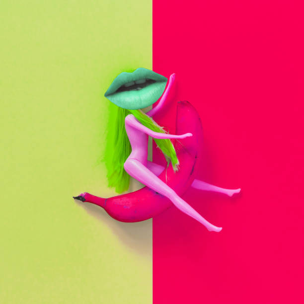 doll with green lips instead of a head riding a banana.