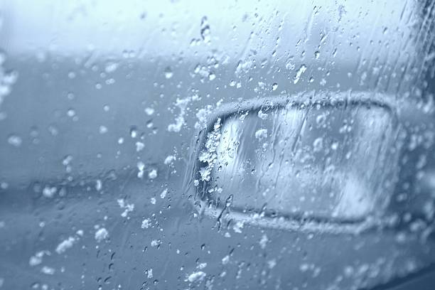 istock Water drops and snowflakes on a car window. 96888484