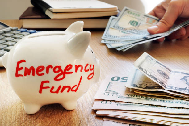 istock Emergency fund written on a piggy bank. 968891000