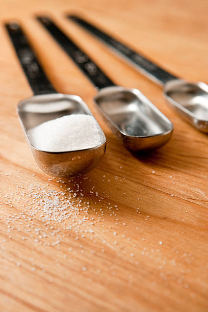 istock Measurings Spoons on Wood Counter with Sugar 96889722