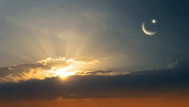 Photo of sunset sky with moon and star