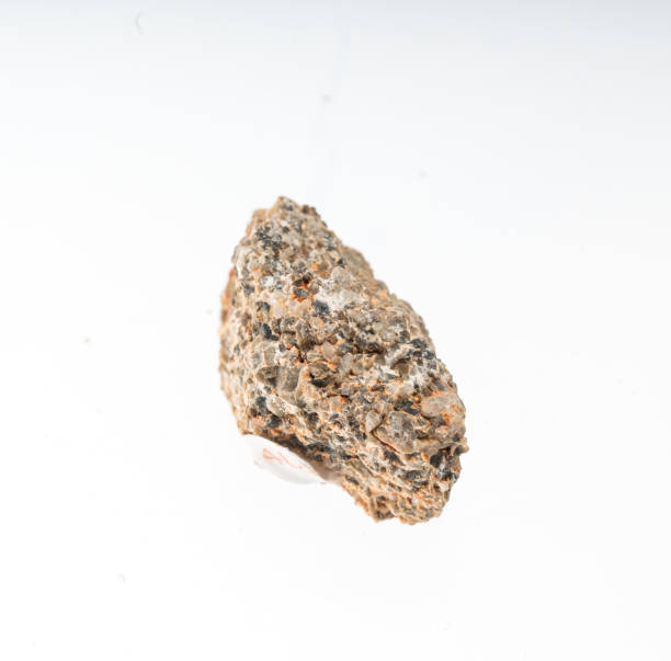 istock conglomerate mineral sample studio shot with white background 968903614