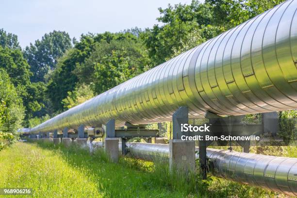 Huge Metal Gas Pipeline Transporting Gas Stock Photo - Download Image Now - Pipeline, Natural Gas, Gas