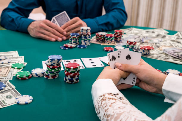 istock Player hands with card combination, casino, gambling 968908932